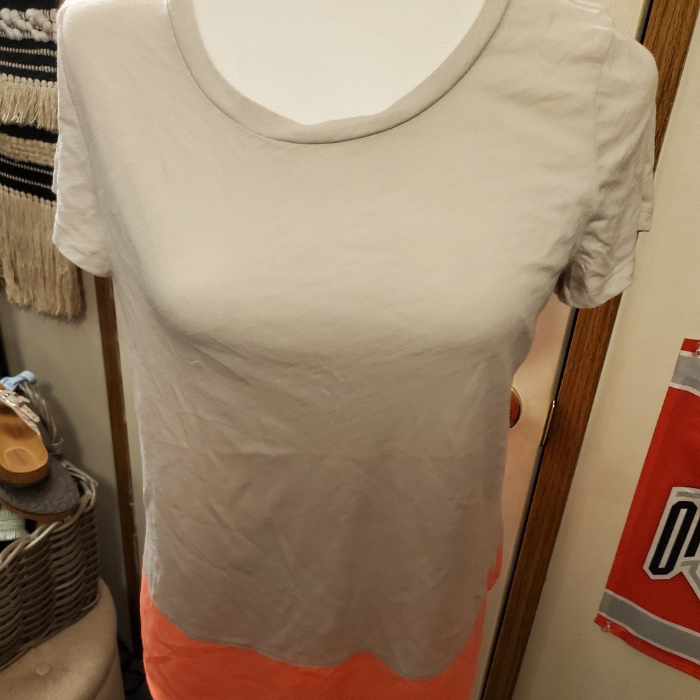 Express short sleeve tan coral shirt.